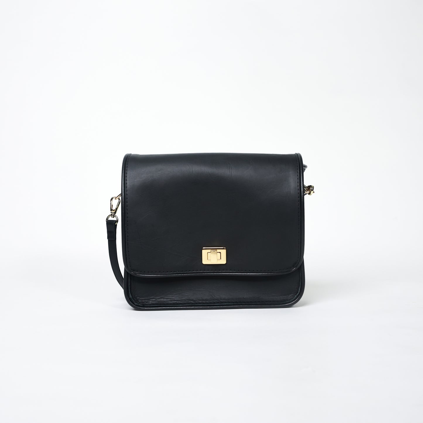 black handcrafted leather crossbody