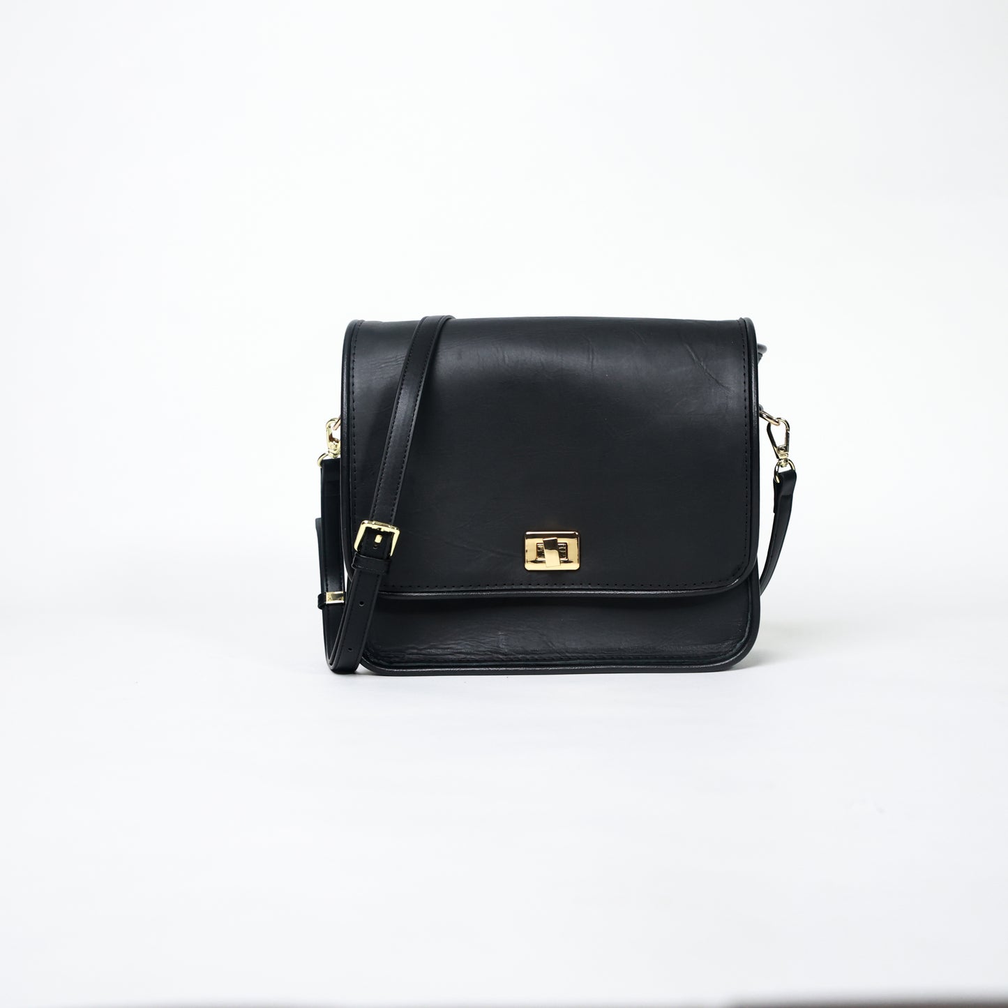 black handcrafted leather crossbody