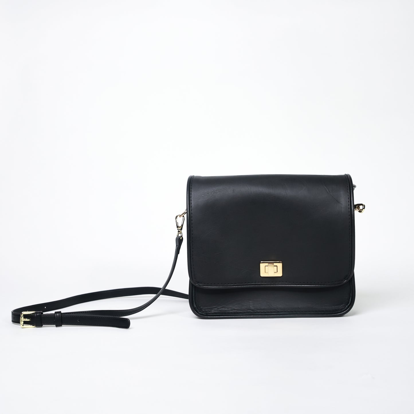 black handcrafted leather crossbody